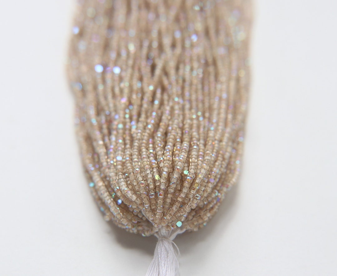 11/0 Hanks Charlotte Cut Beads Patina Cream Lined Aurore Boreale 1/5/25