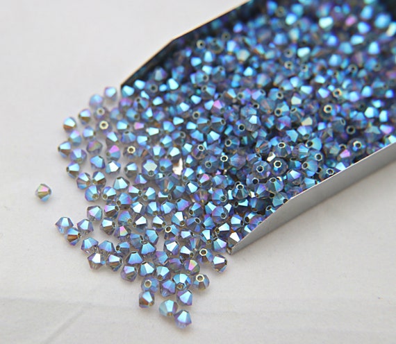 Swarovski 5301 4mm Bicone Beads - Crystal (36)