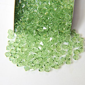 4/5mm Peridot Swarovski Bicone beads 12/36/72/144/432/720 Pieces Made in Austria rare beads, craft supplies, embroidery materials, premium