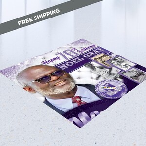 May include: A purple and white birthday card featuring a photograph of a man wearing glasses and a suit. The card reads "Happy 70th Birthday Noel Gray" and includes a logo for KCOBA USA INC. The brave may fall but never yield.
