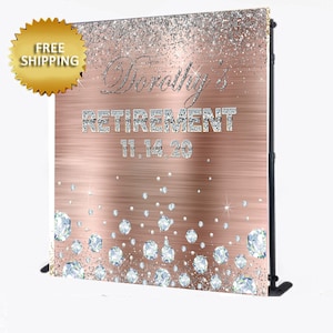 May include: A rose gold backdrop with silver glitter and diamond accents. The text "Dorothy's Retirement 11.14.20" is written in silver glitter.