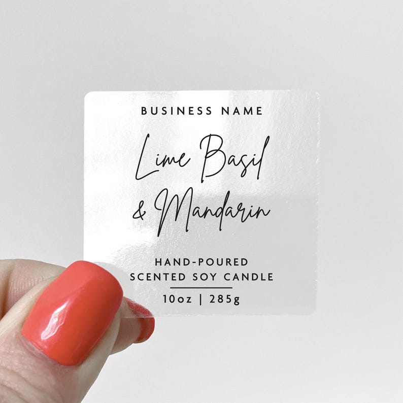 May include: A clear square sticker with black text that reads "BUSINESS NAME", "Lime Basil & Mandarin", "HAND-POURED SCENTED SOY CANDLE", and "10oz | 285g".