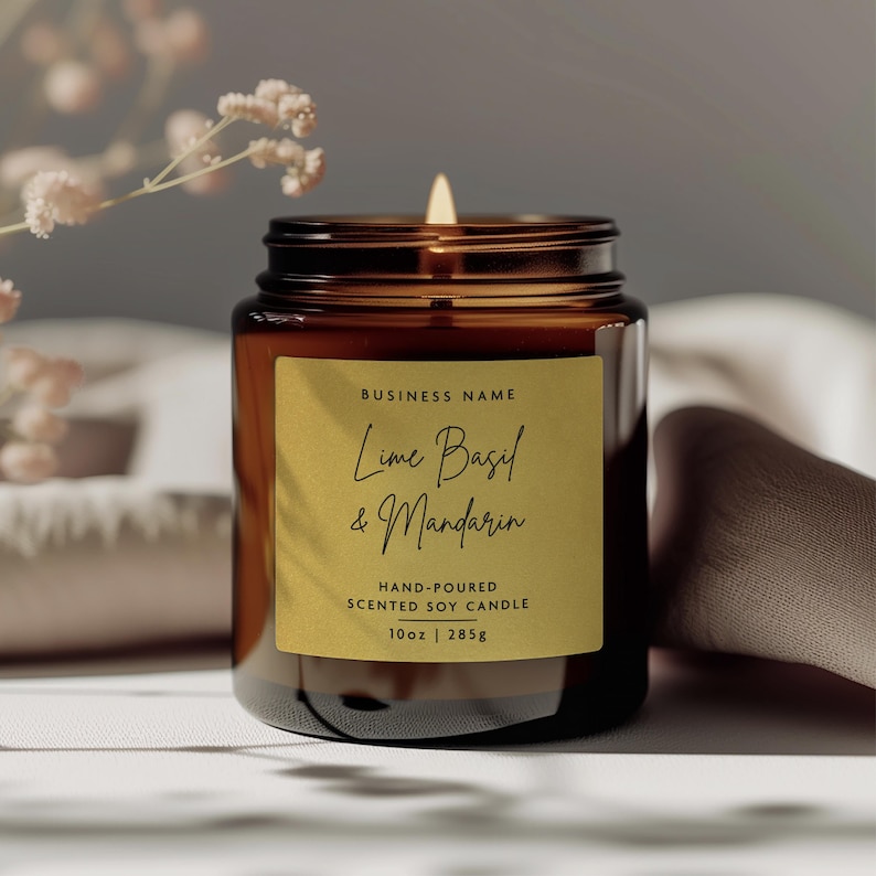 May include: A brown glass candle jar with a gold label that reads "Lime Basil & Mandarin" and "Hand-poured Scented Soy Candle 10oz | 285g".