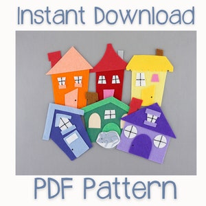 Könnte beinhalten: PDF-Muster für Filzhäuser. Das Muster enthält sechs Häuser in verschiedenen Farben: orange, rot, gelb, blau, grün und lila. Jedes Haus hat eine Tür und Fenster. In der Mitte des Bildes befindet sich eine kleine graue Maus.