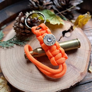 Porte clef pour chasseur ou tireur sportif douille - calibre - winchester- chasse - accessoire mariage - costume - souvenir balle