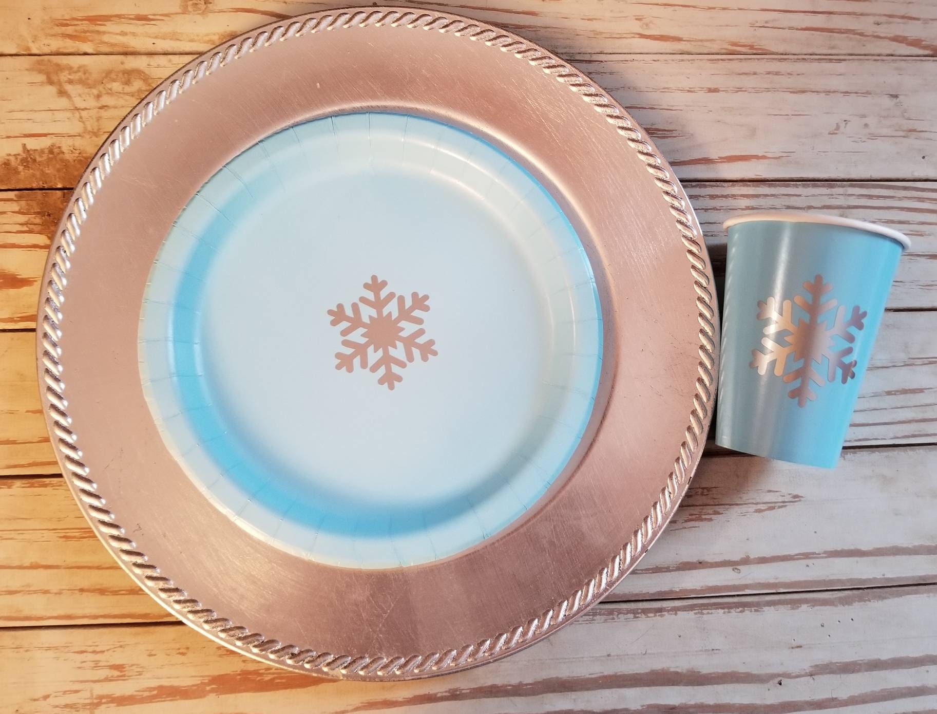 Pink and silver snowflake plates, cups and napkins, blue and silver