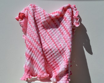 Copertina per neonati all'uncinetto: copertina per carrozzina in acrilico rosa e bianco