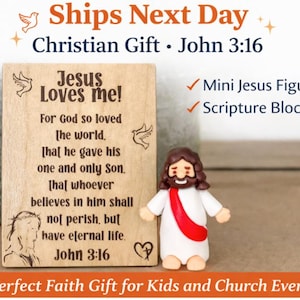 May include: A wooden scripture block with the text "Jesus Loves Me!" and a mini Jesus figurine. The block features a Bible verse from John 3:16. A Christian gift for kids and church events.