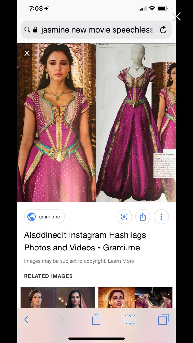 May include: A close-up image of a woman wearing a purple and teal costume with gold accents. The costume features a fitted bodice with a plunging neckline and a flowing skirt. The woman has long dark hair and is wearing gold jewelry. The text "Jasmine (in magenta!)" is visible in the lower right corner of the image.