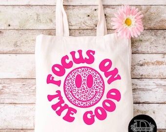 Concéntrese en lo bueno Tote Bag