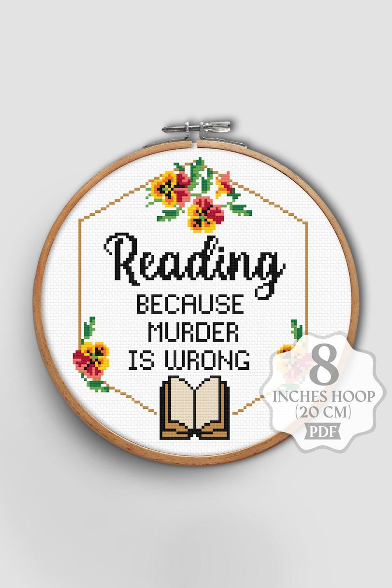 May include: Cross stitch pattern for an 8 inch hoop (20 cm) featuring a book with the text "Reading because murder is wrong" surrounded by yellow and red flowers.