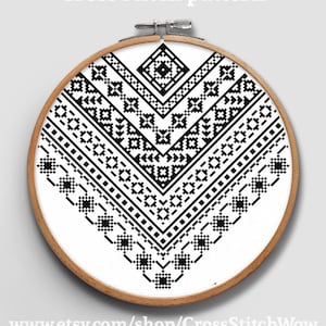 May include: A cross-stitch pattern in a wooden hoop. The design is a geometric black and white pattern. The text "Cross stitch pattern" is at the top, and the website address is at the bottom.