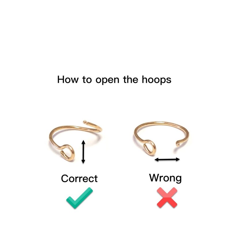 May include: How to open hoops: A gold hoop earring is shown open correctly by bending the wire upwards. A second gold hoop earring is shown open incorrectly by bending the wire sideways. The correct way is marked with a green checkmark and the incorrect way is marked with a red X.
