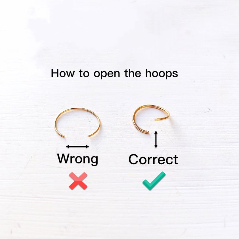 May include: Image demonstrating how to open hoop earrings. Two gold hoops are shown, one incorrectly opened and one correctly opened. The text "How to open the hoops" is at the top. "Wrong" is under the incorrect hoop with a red X, and "Correct" is under the correct hoop with a green tick.