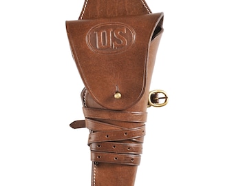 May include: A brown leather holster with a strap and buckle. The holster has a flap with the letters "US" embossed on it.