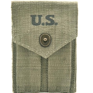May include: A green canvas pouch with a flap closure and a metal button. The pouch has a pocket on the front with the letters "U.S." printed in black.