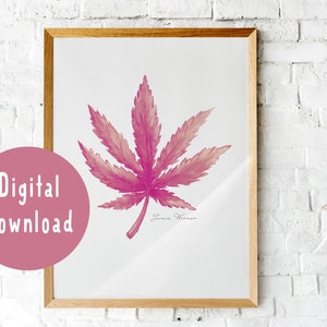 Könnte beinhalten: Ein gerahmter Druck mit einer rosa Aquarellillustration eines Cannabisblattes. Das Kunstwerk ist von Jamie Weaver signiert. Ein rosa Kreis mit den Worten "Digital Download" befindet sich unten links. Der Rahmen ist hellbraun.