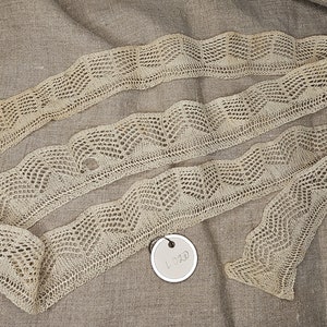 Beautiful handknit slight ruffle edge lace. 1.5"x 1 yd 6" piece. Bought in France in 1980s. This piece isn't perfect, please see photos.