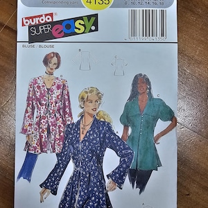 May include: A Burda Super Easy sewing pattern for blouses. The pattern features illustrations of three blouse designs. The pattern includes sizes 8-18 and European sizes 34-44. The pattern's color scheme includes white, green, blue, and pink.