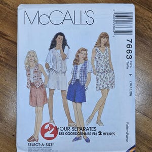 May include: A vintage McCall's sewing pattern featuring illustrations of women's separates. The pattern includes a variety of tops, shorts, and a dress. The cover has the text "McCall's" and "2 Hour Separates". The size is F (16,18,20).