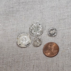 Vintage Czech glass button lot. Clear glass with gold backs that makes them sparkle, multiple sizes, patterns, self shank.