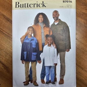 May include: A Butterick sewing pattern envelope featuring a family wearing coats and jackets. The envelope has the text "Butterick" and "B7016". The pattern includes sizes A (XS-L / XS-XL). The image is designed and printed in the USA.