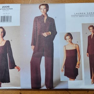 May include: A sewing pattern for a dress and jacket. The pattern is from Vogue American Designer, Lauren Sara. The pattern number is 2006 and the size is 14-16-18. The pattern includes four different styles.