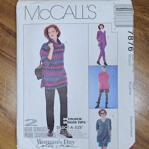 May include: McCall's sewing pattern envelope featuring a woman modeling a tunic and pants outfit. The envelope includes images of other outfit options. The text on the envelope includes "Woman's Day Collection" and "Select-A-Size".