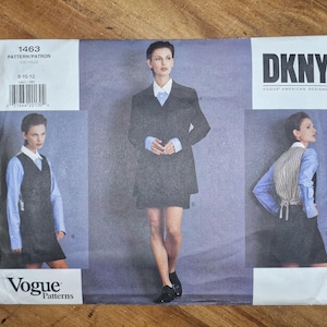 May include: A sewing pattern envelope featuring a DKNY design. The envelope displays images of a woman wearing a blazer, vest, and dress. The Vogue Patterns logo is visible, along with the pattern number 1463 and size range 6-10-12.