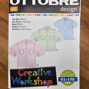 May include: A sewing pattern for shirts, with illustrations of three shirt designs in pink, green, and blue. The cover reads "OTTOBRE design" and "Creative Workshop". Sizes range from 92-170 cm.