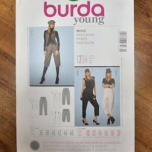 May include: A sewing pattern titled "burda young" for pants, featuring illustrations of different pant styles. The pattern includes sizing information in both US and European measurements. The cover is white with pink and black text.