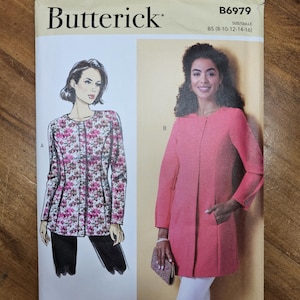 May include: A Butterick sewing pattern envelope featuring illustrations of two women's jackets. One jacket is floral, the other is solid pink. The pattern number is B6979, and the size range is B5 (8-10-12-14-16).
