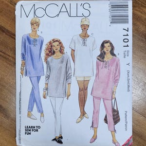 May include: A McCall's sewing pattern envelope featuring illustrations of four different outfits. The outfits include tops and pants in various colors, with a lace-up detail at the neckline. The text "LEARN TO SEW FOR FUN" is also visible.