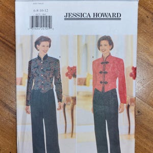 May include: A Butterick sewing pattern, featuring a Jessica Howard design. The pattern includes options for a jacket and pants ensemble. The jacket options are shown in red and patterned fabric. The pattern size range is 6-8-10-12.