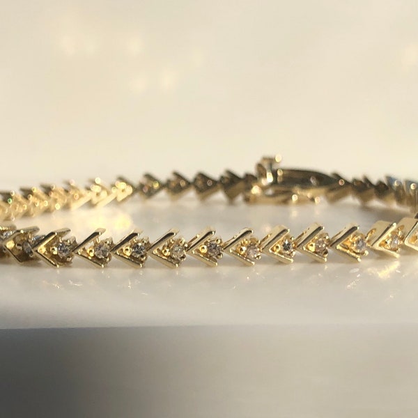 Bogen & Pfeil - Diamant-Tennis-Armband - 14 k Gelbgold - 43 Diamanten - 1,50 ct Diamanten - 7,5 Zoll Armband - 1970er Jahre Armband - 43. Geburtstag