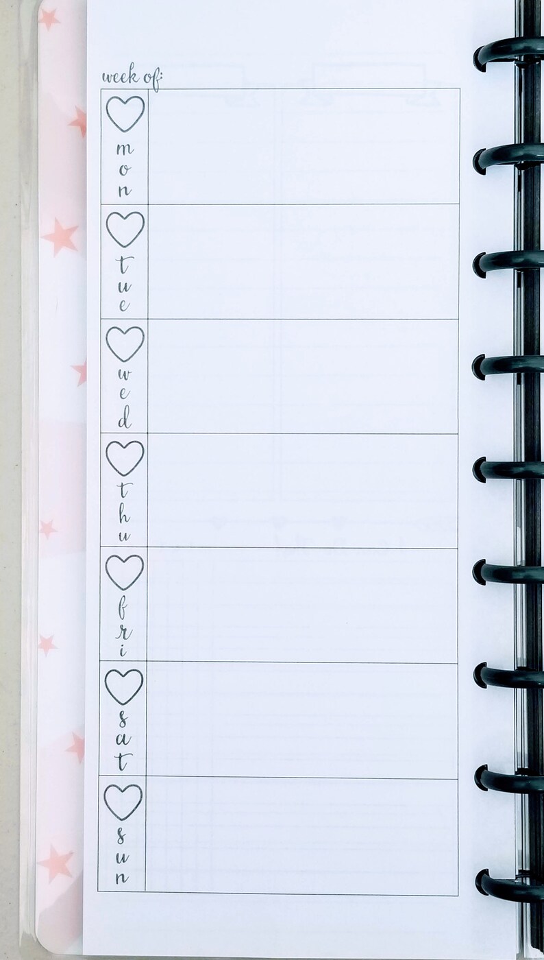 May include: A weekly planner with a white background and black lines. The days of the week are listed on the left side of the page, with a heart symbol next to each day. The text "week of:" is at the top of the page.