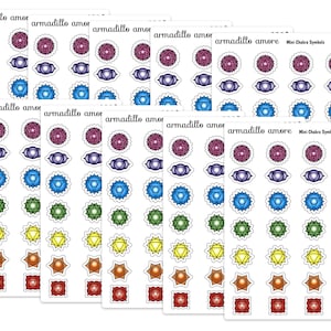 May include: Multiple sheets of adhesive stickers featuring mini chakra symbols in various colors and shapes. Each sheet displays the text armadillo amore and Mini Chakra Symbols 293A. The designs include purple, blue, green, yellow, orange, and red icons.