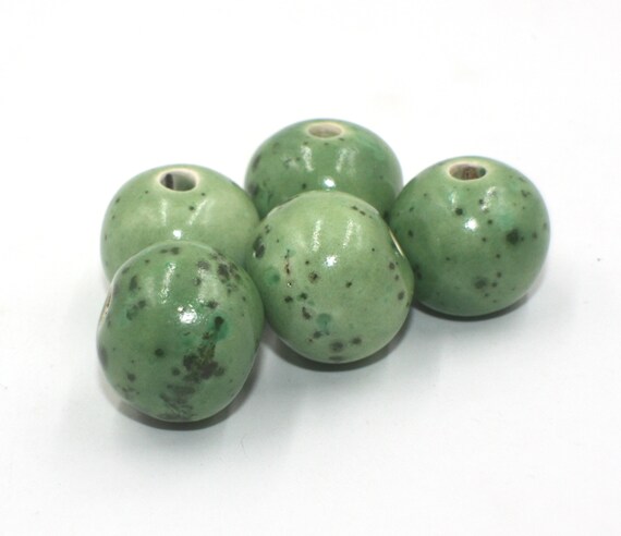 green and grey round handcrafted ceramic beads