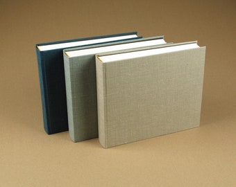 Linen photo album with gold finish, approx. 22x25cm, ivory cards