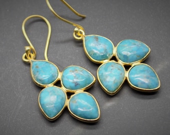 Pendientes de turquesa azul: Plata u oro, diseño floral colgante, piedra natal de diciembre, joyería de gema azul