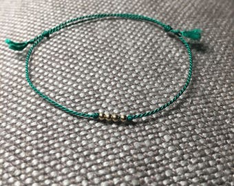 Simple GREEN thin bracelet with beads (silk string)--The Simplicity bracelet