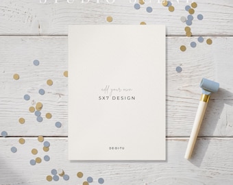 May include: A rectangular white card with the text add your own 5X7 DESIGN and DE-DI-TU printed in black. The card is surrounded by scattered blue and gold confetti circles and a light blue and white party horn on a white wooden surface.