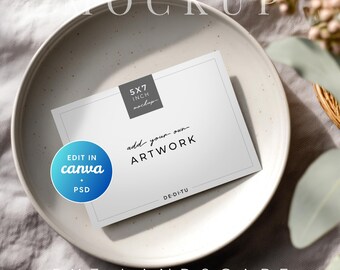 May include: A white 5x7 inch landscape mockup card with the text "add your own ARTWORK" on a speckled ceramic plate. A blue circle with "Edit in Canva + PSD" is on the left. The word "MOCKUP" is at the top.