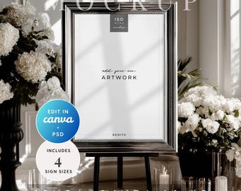 May include: A silver framed picture frame on a black easel, with the text "add your own ARTWORK". The frame is surrounded by white flowers and candles. The image includes the text "EDIT IN canva + PSD" and "INCLUDES 4 SIGN SIZES".