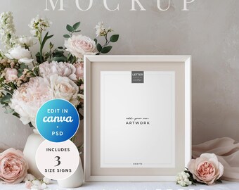 May include: A white picture frame mockup with a blank interior, next to a vase of pink and white flowers. The frame is labeled "LETTER" and "8X10" with the text "add your own ARTWORK". A blue circle says "EDIT IN canva + PSD" and a white circle says "INCLUDES 3 SIZE SIGNS".