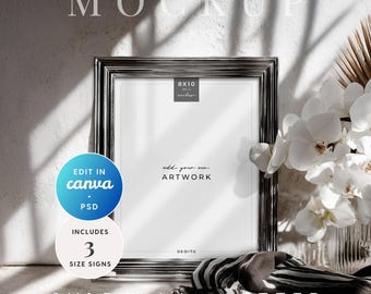 May include: A silver framed 8x10 inch mockup with the text "add your own ARTWORK". The image includes a blue circle with "EDIT IN canva + PSD" and a white circle with "INCLUDES 3 SIZE SIGNS". A black and white scarf and white flowers are also in the image.
