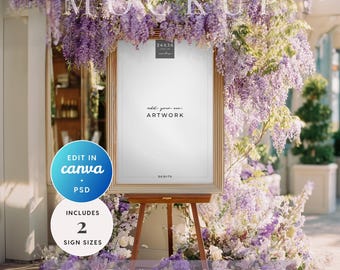 May include: A framed sign mockup with a gold frame, displayed on a wooden easel. The sign is surrounded by purple flowers and greenery. Text on the sign includes "add your own ARTWORK" and "24x36 inches". Additional text includes "EDIT IN canva" and "INCLUDES 2 SIGN SIZES".