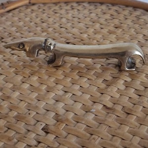 Vintage beautiful filigree bottle opener by Walter Bosse dachshund, solid brass, dachshund bottle opener