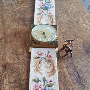 Gobelin wall clock hand-embroidered a rarity, in the form of a wristwatch with a golden watch case Junghans movement in working order from the 70th