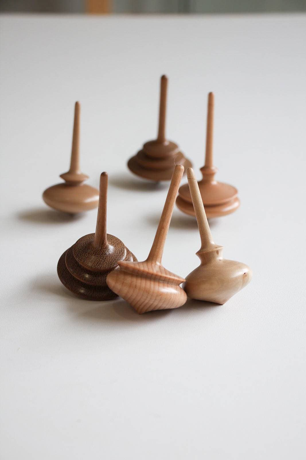 Handmade wooden spinning tops.